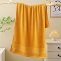 Absorbent yellow cotton bath towel with textured geometric pattern hanging on a wood rod - Luxury Cotton Bath Towel (Yellow) / 70*140cm