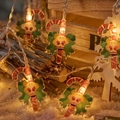 LED warm yellow Christmas string lights with candy cane and Santa Claus charms decoration - Candy Cane