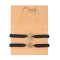 Detail of handmade black woven Halloween spider and web bracelets on brown kraft card - Spider + Spider Web / All Black 2-Piece Set