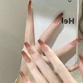 Detailed view of long coffin ombre press-on nails in amber and pink gradient finish - Brown Red Jelly Ombre (AW257)