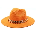 Detailed view of an orange straw jazz hat featuring a decorative thick gold chain band - M (56-58cm) / Single Orange Hat