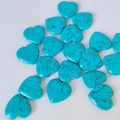 Polished heart-shaped turquoise stone ornaments with natural black vein textures - Blue Turquoise (Synthetic)