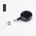 Retractable badge reel with solid black round shell and transparent PVC strap clip - Black