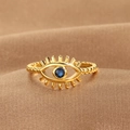 Gold-plated Evil Eye open ring with blue stone on luxury brown satin background - Evil Eye Beaded Ring (Q-J086) / Gold