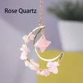 Hanging rose quartz suncatcher with golden crescent moon and star crystal prisms - Merkabana Pink Crystal Chip Moon Pendant