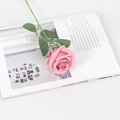 Elegant single pink velvet artificial rose placed on an open magazine for home decor - Silk Dusty Pink