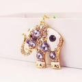 Portachiavi elefante dorato con strass viola e smalto bianco su scatola bianca - Viola Chiaro