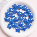 Perline a stella blu cangianti in una ciotola bianca per la creazione di gioielli fai-da-te - Diametro 22mm / Tinta unita Blu reale