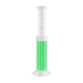 Green toilet gel stamp dispenser with white plastic applicator for bathroom freshness - Gardenia