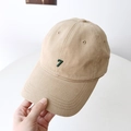Minimalist beige washed cotton baseball cap featuring dark green number 7 embroidery detail - Khaki