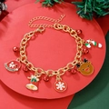 Christmas charm bracelet with Santa hat, bells, and snowflakes on a festive red base - D1239 (Christmas Hat with Bell)