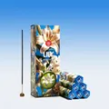 Mahendra Lily incense sticks in blue floral packaging with sticks on a round holder - Lily