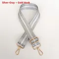 Close-up of adjustable silver-grey nylon bag strap with gold hooks and stripe texture - Silver Grey + Gold Hook