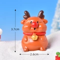 Miniature orange Christmas reindeer resin figurine with red scarf, height 3.7cm and width 2.6cm - No. 2 Bell Reindeer