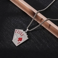 Macro detail of silver poker royal flush pendant with sparkling zircons and red enamel - XL17 / Royal Flush Poker / Silver Red