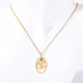 Golden titanium zodiac necklace with purple gemstone and matte finish on white model - Cancer