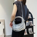 Silver knot woven crossbody bag with metallic rope design for a stylish look - Silver