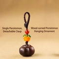 Handmade persimmon and peanut keychain with red beads and dark brown woven cord - Good Things Happen Red Persimmon Keychain