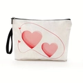 Canvas makeup bag with pink heart print, black zipper, and wristlet strap for women - Style 2