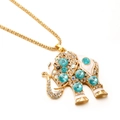 Collier pendentif éléphant doré avec cristaux bleus et émail blanc sur fine chaîne en or - Éléphant en Cristal Bleu Ciel