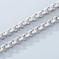 Silver 304 stainless steel chain featuring Greek key pattern engraved on oval links - 9mm Greek Key Pattern Steel Color