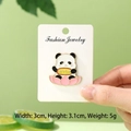 Cute panda on pink lotus enamel pin with He Qi Sheng Cai gold medallion detail - Wealth Gathering Panda