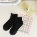 Women's minimalist black ribbed cotton socks with breathable knit texture in dark finish - One Size / Black