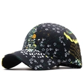 Floral print baseball cap with black base, white flower patterns and yellow curved brim - Adjustable / Five-Petal Flower Wave Style / Black White Floral Wave (02)