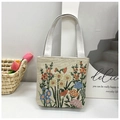 Detail of small canvas tote bag with colorful floral embroidery on beige linen texture - Style 2-Mixed Flowers