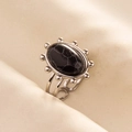 Detailed view of bohemian stainless steel ring with oval black stone and marble texture - Silver Base Black Stone / Silver & Black