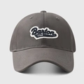 Close-up of Barton 1768 embroidery on a structured dark grey cotton baseball cap - Gray