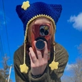 Handmade navy blue knit cat ear beanie with yellow star charms in outdoor daylight - Adult 56-59cm / Blue-Yellow