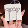 Elegant S925 silver needle bow drop earrings with sparkling rhinestone tassels - Full Rhinestone Bow Dangle Tassel Earrings (E0249)