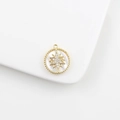 Close-up of 18k gold starburst pendant with white mother of pearl and zircon stones - Round Snowflake Disk 16.5mm