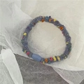 Elastic hair tie featuring light blue knit with colorful fuzzy pom-poms and blue buckle - Handmade Wool / Wool Blue
