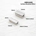 Macro detail of rectangle stainless steel beads with brushed finish and center hole - Rectangle (16x6mm, Hole 2.5mm) / Steel Color (Brushed Matte)