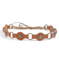 Detailed macro view of vintage brown leather waist belt with turquoise stones and brass rings - Bronze Camel