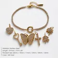 14K vergoldetes Edelstahl-Tennisarmband mit funkelnden CZ-Schmetterlings- und Herzanhängern - Schmetterling Herz Schlüssel Anhänger (XBL0317) / Gold