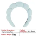 Detail showing dimensions of the light blue padded sponge headband and its soft texture - 16-light Blue Terry Cloth Headband
