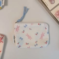 Detail of canvas mini coin purse featuring pink rabbit and blue bow floral patterns - White Pink Bunny Bow