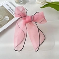 Pink organza hair bow ribbon with black stitched edges and semi-transparent texture - Pink