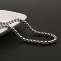 Sleek silver stainless steel round box chain necklace for men and women on white ceramic - 5.0mm Width 50cm Length / Steel