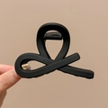 Matte black shark hair claw clip in a twisted cross design for high ponytail styling - Black Matte Twist Claw 8cm