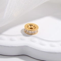 Macro di una perlina distanziatrice dorata con zirconi bianchi per creazione gioielli DIY - Diamante bianco / 8mm / Oro