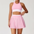 Pink high-waist pleated sports set with racerback crop top and white stripe details - Light Pink / S