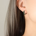 U-shaped titanium steel hoop earrings with pavé set green crystals for a stylish look - Silver Color Green Zirconia