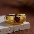 Macro shot of 18K gold plated S925 silver ring featuring red heart garnet on stone base - Natural Garnet Wide Band Ring LR281