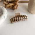 Detail of matte khaki hair claw clip on white surface with minimalist decor - Coffee Large Tooth