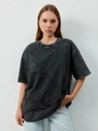 Vintage dark grey washed cotton oversized T-shirt with drop shoulder design on model - Washed Black