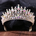 Detail of a golden bridal hair comb featuring rainbow rhinestones and crystal accents - KC Gold White + AB Rhinestone